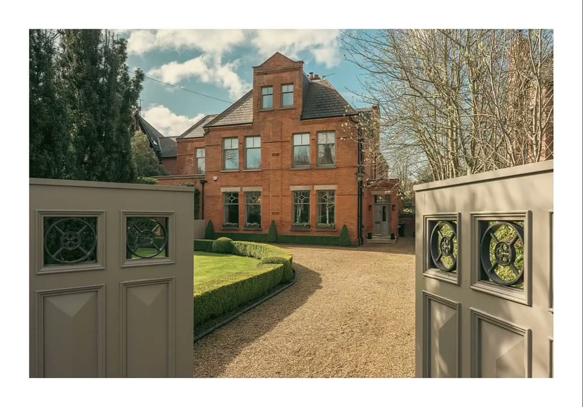 Phantom property photograph of a bespoke red brick family home on a leafy avenue off the Malone Road in South Belfast