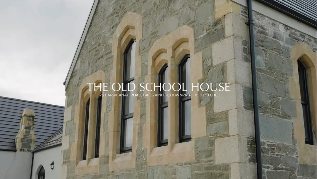 Cinematic Phantom film still of The School House at Ballykinler, a reimagined old schoolhouse home near Tyrella Beach, captured in autumn light