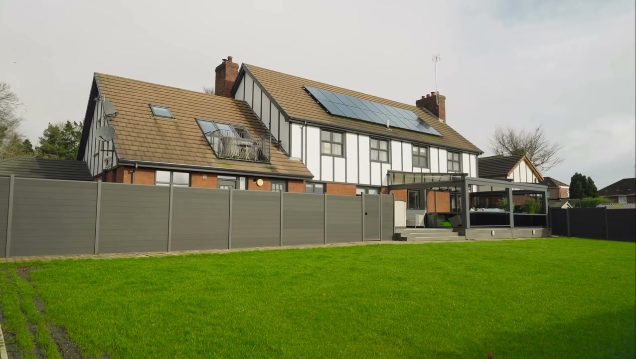 Phantom cinematic film still of a large detached six-bedroom family home on an elevated site above Belfast Lough at Glengormley