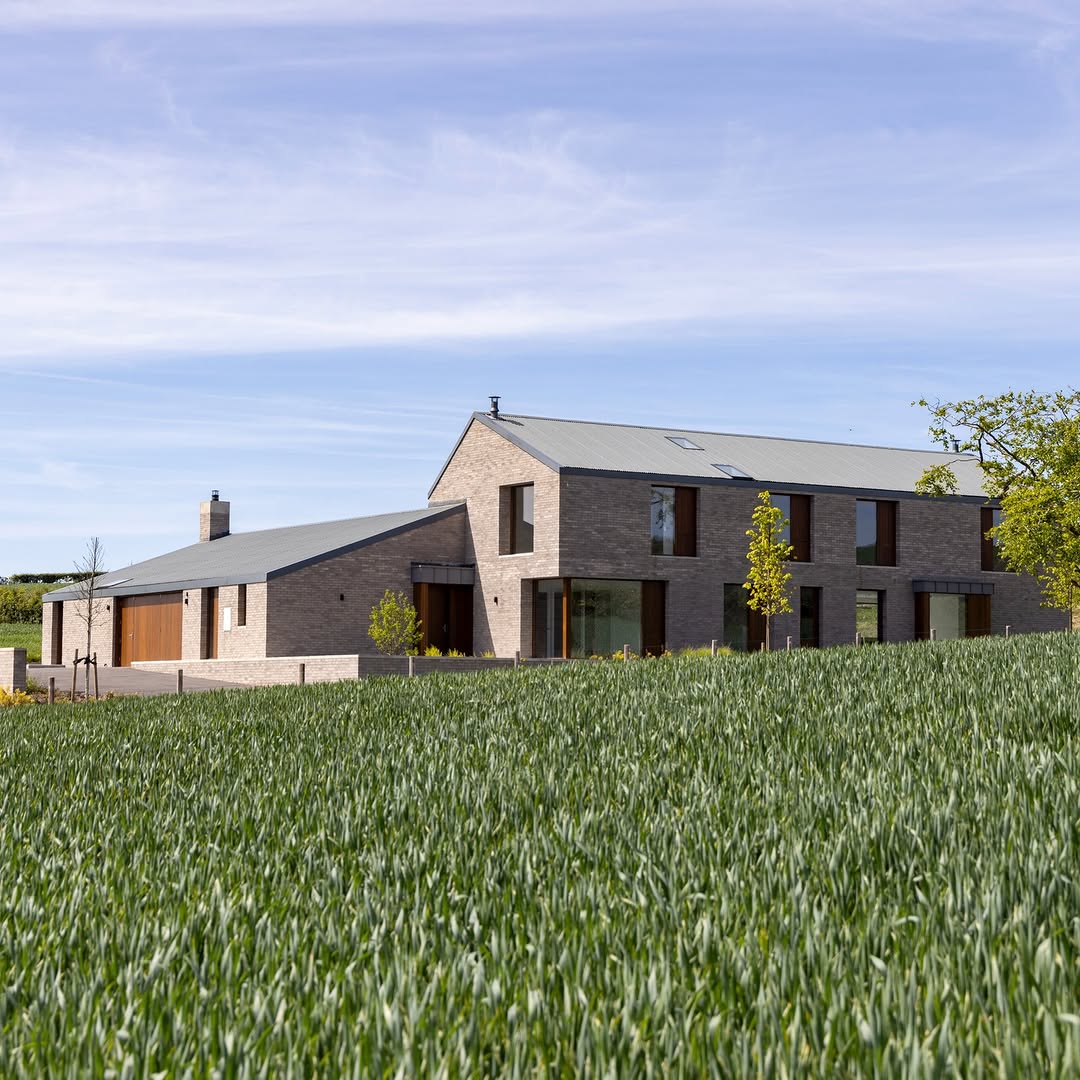 Phantom property film still of a contemporary detached farmhouse-style home set on an acre of lawn and paddock near Holywood